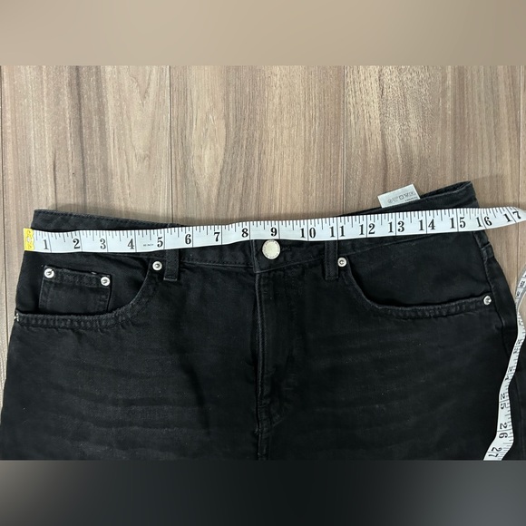 Faded black denim mini skirt with distressed hem - Picture 5 of 7